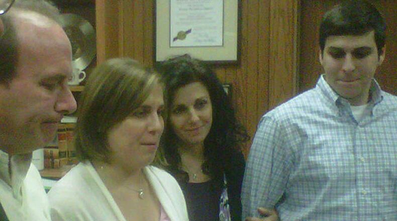 Lauren Burk's family addresses the news media after a jury recommended Courtney Lockhart be sentenced to life without parole Thursday for killing the Marietta teenager.