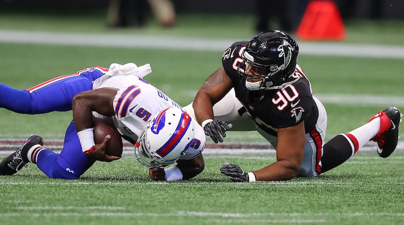 Falcons defensive end Derrick Shelby sacks Bills quarterback Tyrod Taylor during the first half in a NFL football game on Sunday, October 1, 2017, in Atlanta. Curtis Compton/ccompton@ajc.com