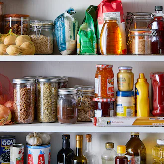A pantry with many ingredients on the shelves. (Julia Gartland/The New York Times)