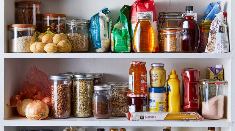 A pantry with many ingredients on the shelves. (Julia Gartland/The New York Times)