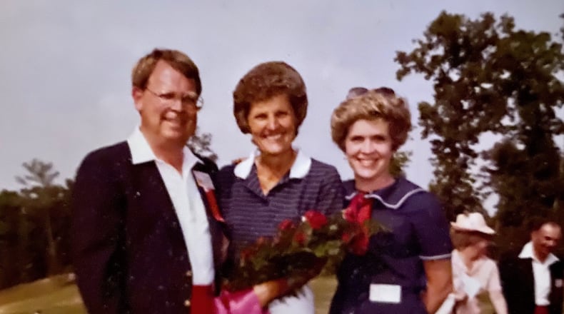 Butch Hansen with wife Mary Ann Hansen surround Kathy Whitworth, who won the 1982 Lady Michelob Classic hosted by Hansen at Brookfield West.