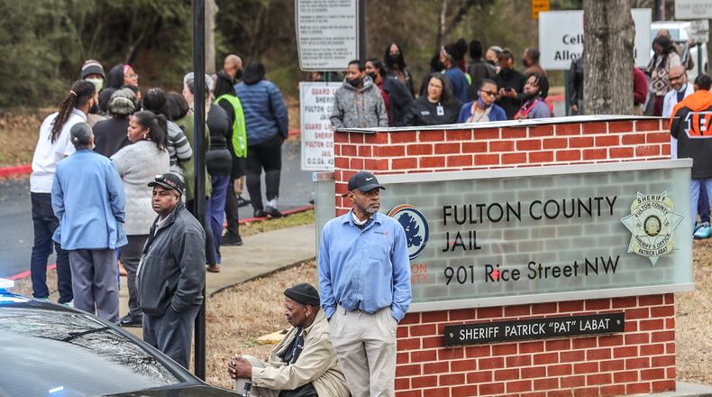 A small fire intentionally set by two detainees at the Fulton County Jail sparked an evacuation of one of the facility's dorms, a sheriff's office spokeswoman said.
