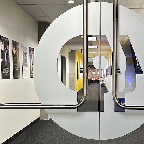 FILE - An entrance to the Arizona PBS offices in the Walter Cronkite School of Journalism and Mass Communication in Phoenix is seen, May 2, 2025. (AP Photo/Katie Oyan, File)