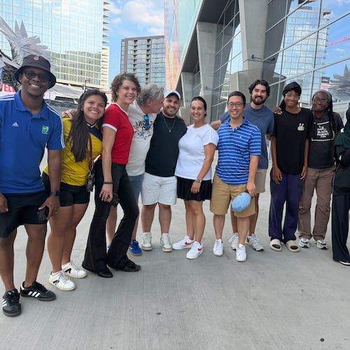 Atlanta sports marketer Vince Thompson (fourth from left) with a group of family, friends, associates, members of the Soccer in the Streets community and an AJC writer pose for a photo outside Mercedes-Benz Stadium at the Haiti-Morocco World Cup game June 24, 2026. (Photo courtesy of Vince Thompson)