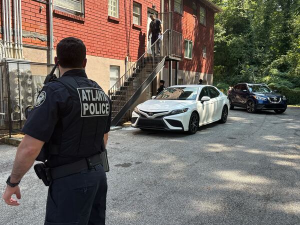 Atlanta police canvassed the area where 30-year-old Deonta Wallace was fatally shot in July 2018. (David Aaro /AJC)