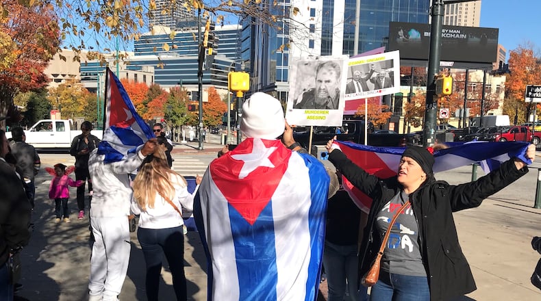 Cuban Americans held a rally in downtown Atlanta on Sunday, November 14, 2021 to advocate for change in their homeland, and to support activists in Cuba planning a day of protests the following day.