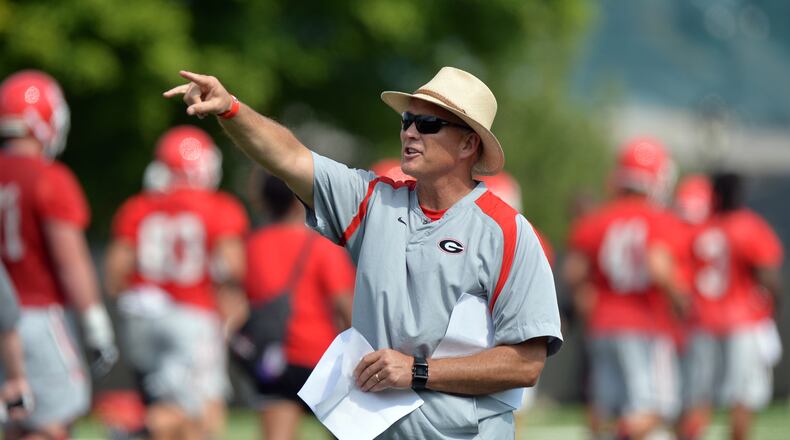 Georgia head coach Mark Richt gives instructions during the first day of practice Friday August 1, 2014. BRANT SANDERLIN /BSANDERLIN@AJC.COM .