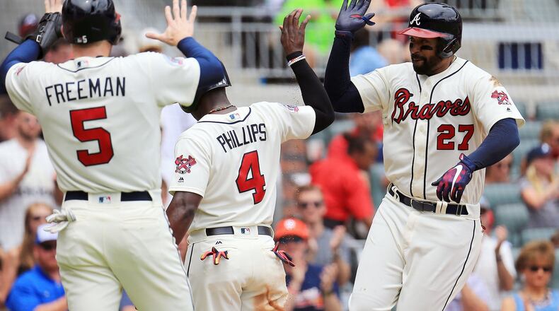 Freddie Freeman, Brandon Phillips and Matt Kemp have formed the core of a productive Braves' offense this season. (Daniel Shirey/Getty Images)