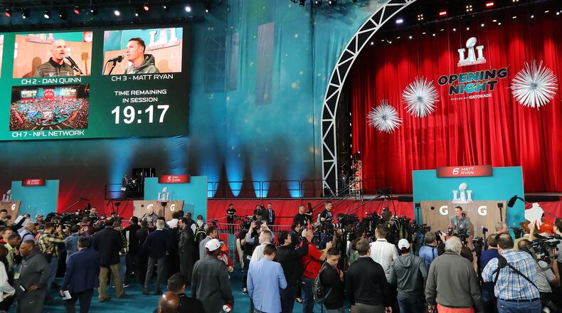 January 30, 2017, Houston: Dan Quinn and Matt Ryan gather a crowd during the Super Bowl Opening Night on Monday, Jan. 30, 2017, at Minute Maid Park in Houston. Curtis Compton/ccompton@ajc.com