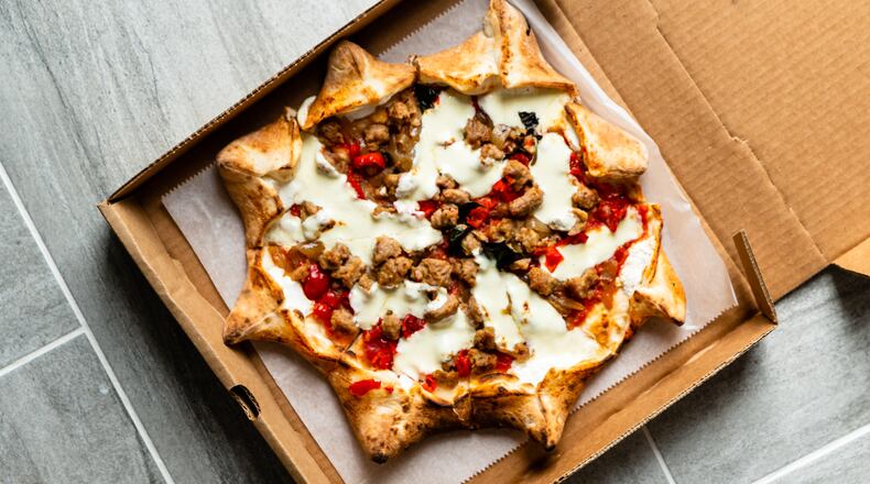 Whichever pie you order at Amalfi Pizza downtown, make sure to get it Carnevale-style. CONTRIBUTED BY HENRI HOLLIS