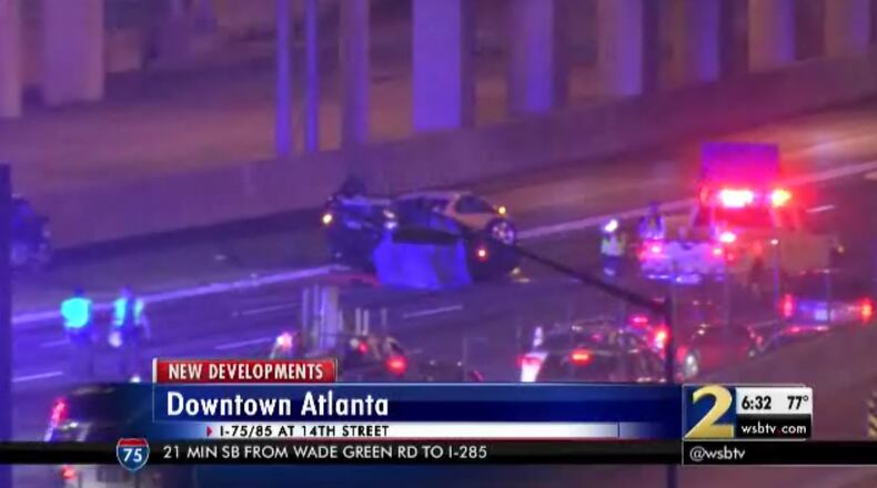 A woman was killed Wednesday night in a three-vehicle crash on the Downtown Connector. (Credit: Channel 2 Action News)