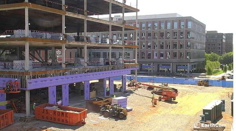 Crews continue work on July 9, 2018 of the Georgia Cyber Center on Augusta University's Riverfront Campus. State leaders have scheduled a grand opening of the building in the background Tuesday. PHOTO CREDIT: GEORGIA CYBER CENTER