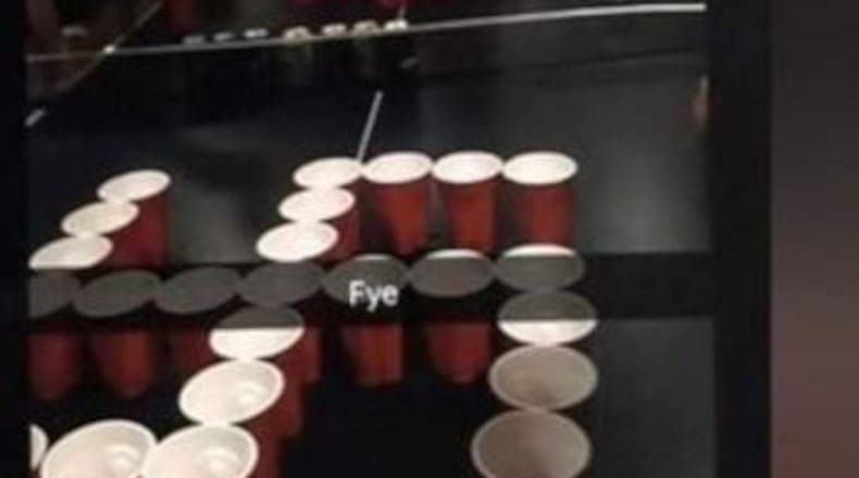 A social media photo by Lovett students of cups arranged like a swastika and Star of David in a game of beer pong led to expulsion and suspension.