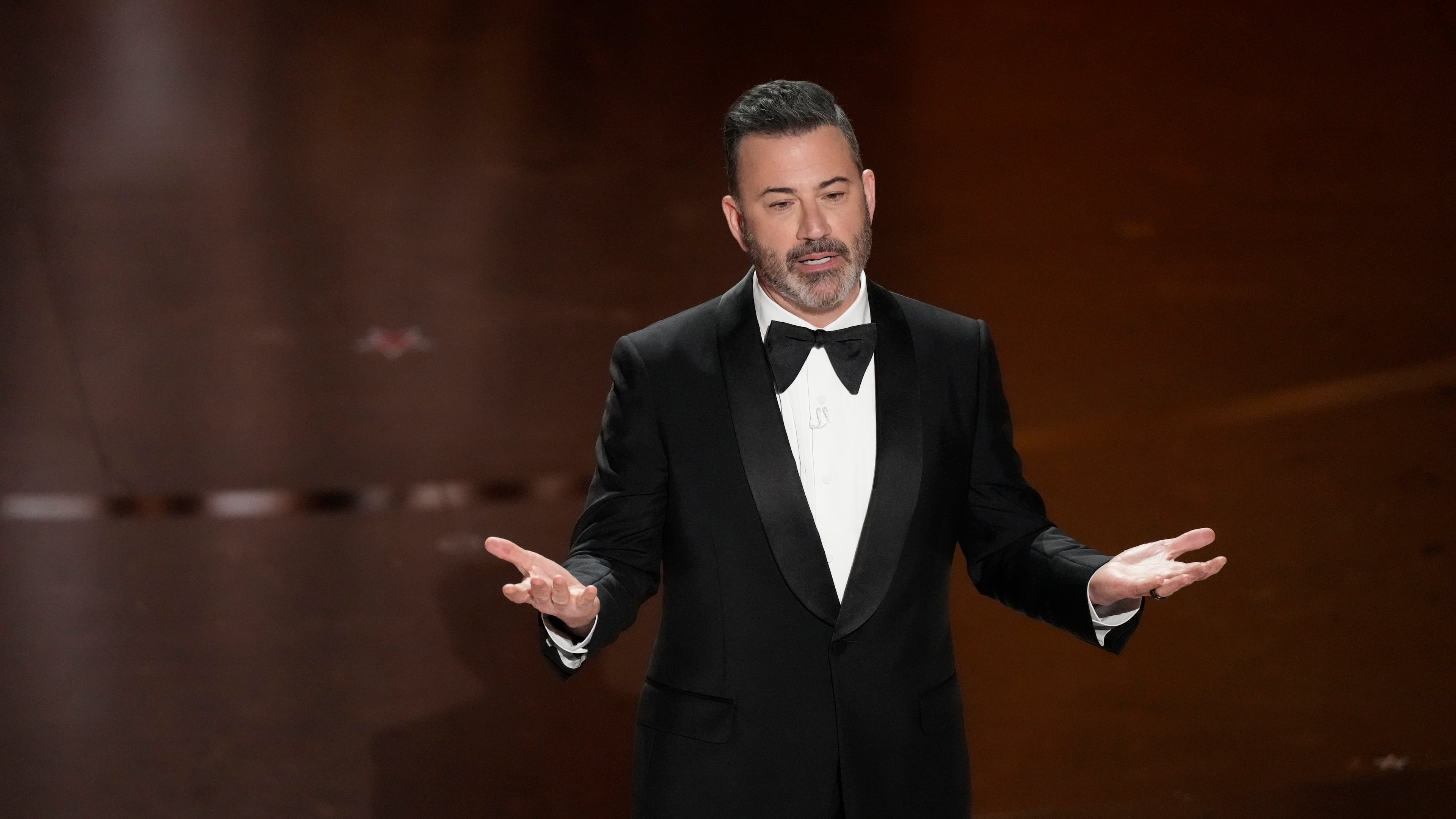 FILE - Host Jimmy Kimmel speaks during the Oscars at the Dolby Theatre in Los Angeles, March 10, 2024. (AP Photo/Chris Pizzello, File)