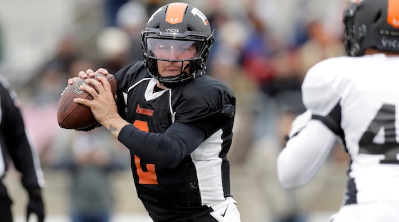 Former Heisman Trophy-winning quarterback Johnny Manziel (2) scrambles as he looks to throw during a developmental Spring League football game, Saturday, April 7, 2018, in Austin, Texas. Manziel is hoping to impress NFL scouts in his bid to return to the league. (AP Photo/Eric Gay)