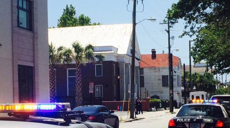 Police closed the street in front of Morris Brown AME Church in Charleston on Thursday, June 18, 2015, shortly after a vigil ended for victims of a fatal shooting nearby Emanual AME Church on Wednesday night.