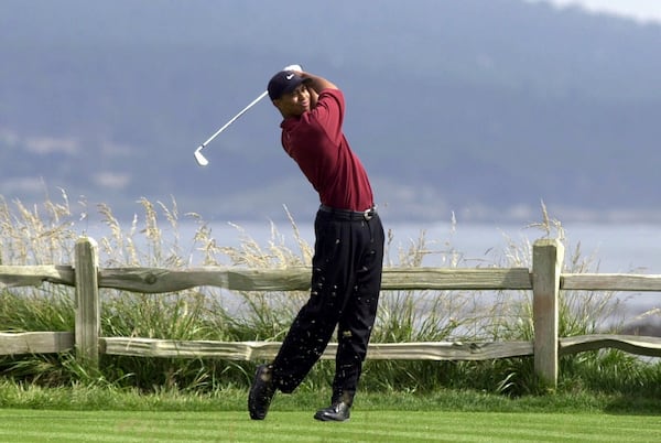 FILE - Tiger Woods drives the 18th hole on his way to winning the 100th U.S. Open Golf Championship at the Pebble Beach Golf Links in Pebble Beach, Calif., Sunday, June 18, 2000. (AP Photo/Elise Amendola, File)