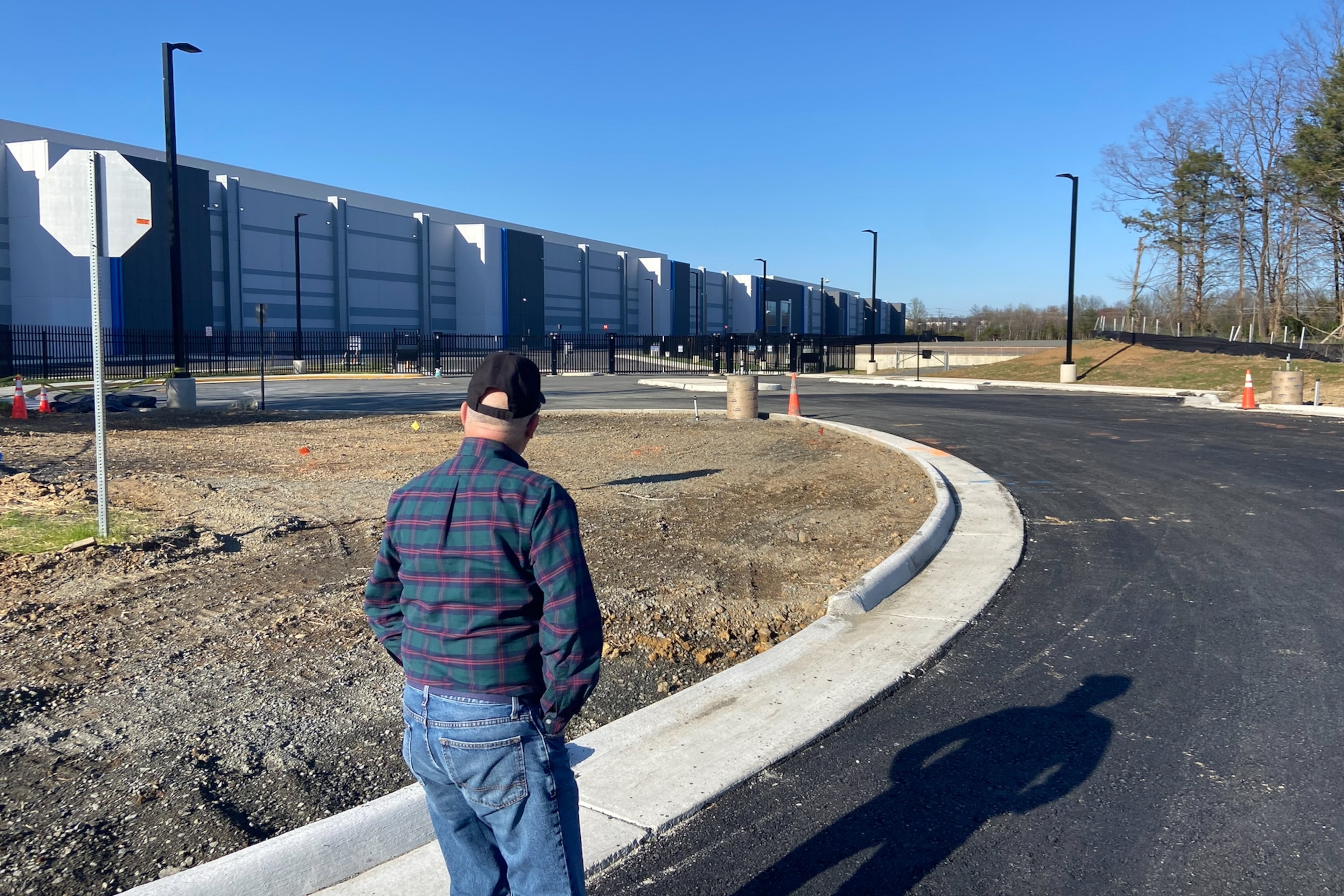 Bill Wright moved to Prince William County in 2020 to retire amid nature, only to find himself living near multiple large data center campuses. "It’s like a data center amoeba," he said. (Zachary Hansen/AJC)