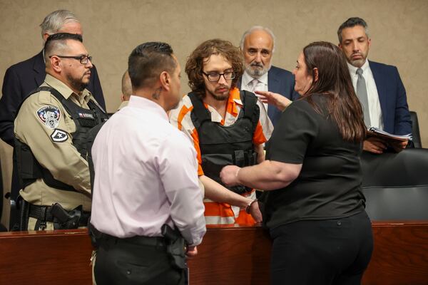 Adriana Zandri, widow of Ivan Manzano killed during the Walmart mass shooting, hugs defendant Patrick Crusius during a plea hearing in El Paso, Texas, Tuesday, Tuesday, April 22, 2025. (Ruben R. Ramirez/Pool Photo via AP)
