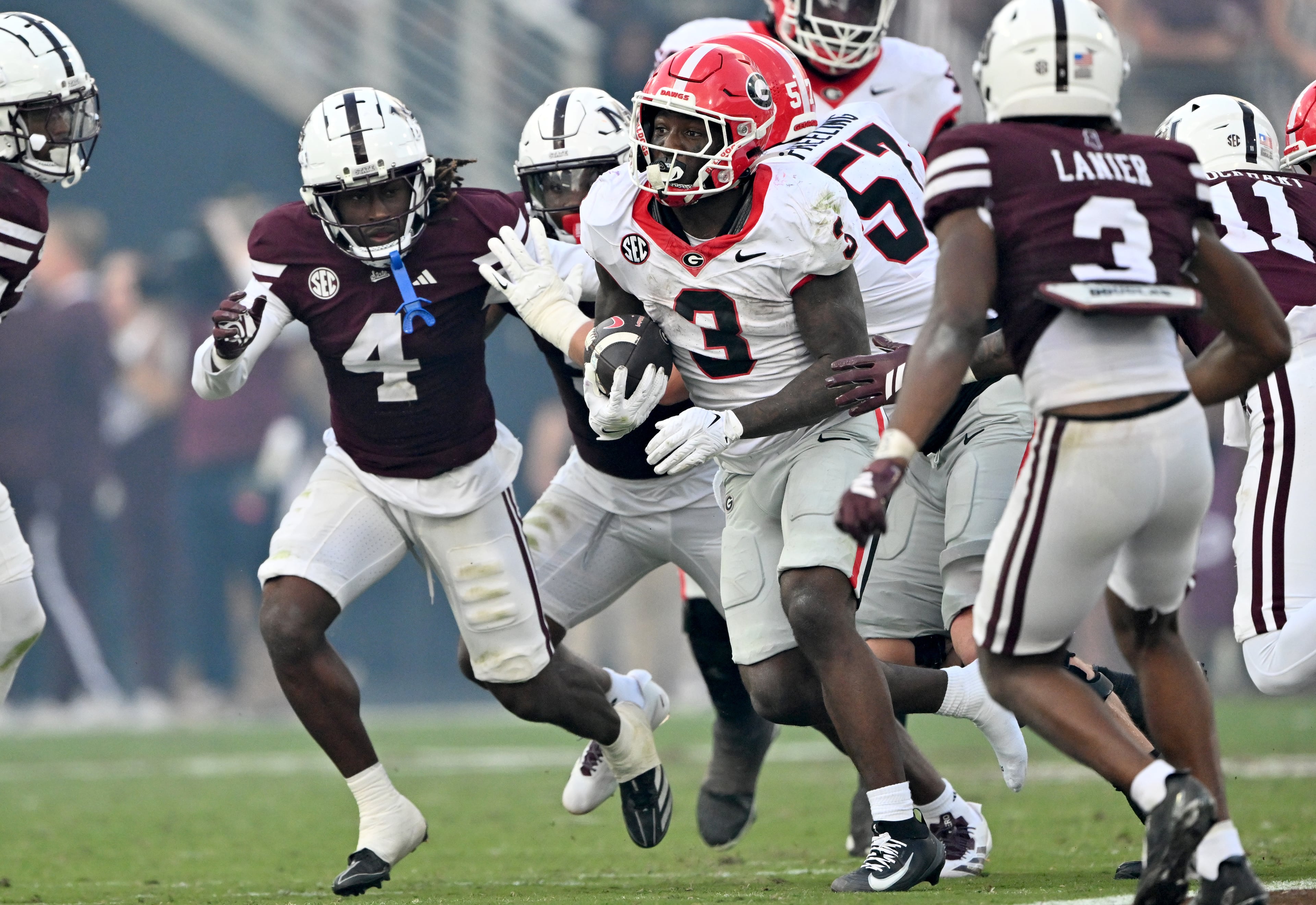 Georgia running back Nate Frazier (3) runs for a first down during the second half in an NCAA football game at Davis Wade Stadium, Saturday, November 8, 2025, in Starkville, Mississippi. Georgia won 41-21 over Mississippi State. (Hyosub Shin / AJC)