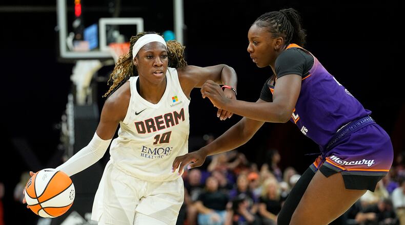 Atlanta Dream forward Rhyne Howard (left) also had 12 rebounds. AP file photo