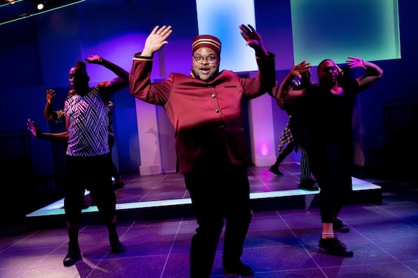 Eddie Weaver, center, as Usher, flanked by actors playing his Thoughts. (Courtesy of Casey Gardner Ford)