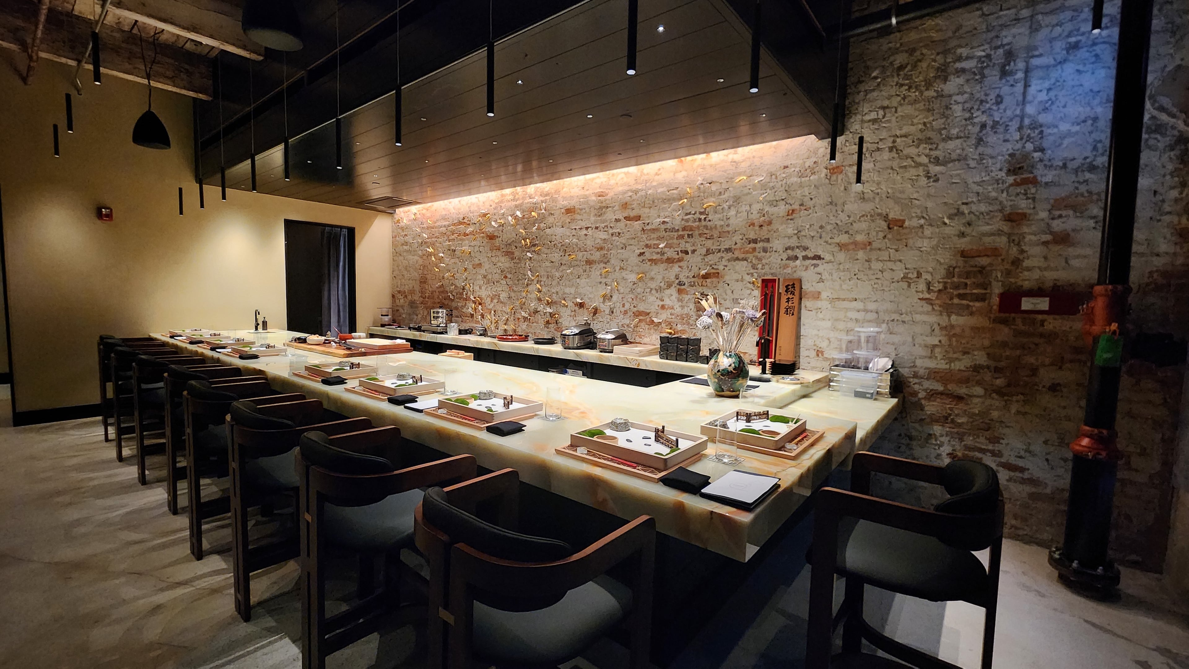 Ryokou has omakase-style service, with a limited number of seats, but the menu isn’t exclusively sushi. Instead, diners are served a variety of courses, more like a traditional tasting menu. (Courtesy of Brandon Amato/Ryokou)