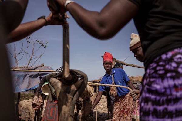 People mine for gold in the Kedougou region of Senegal on Thursday, Jan. 16, 2025. (AP Photo/Annika Hammerschlag)