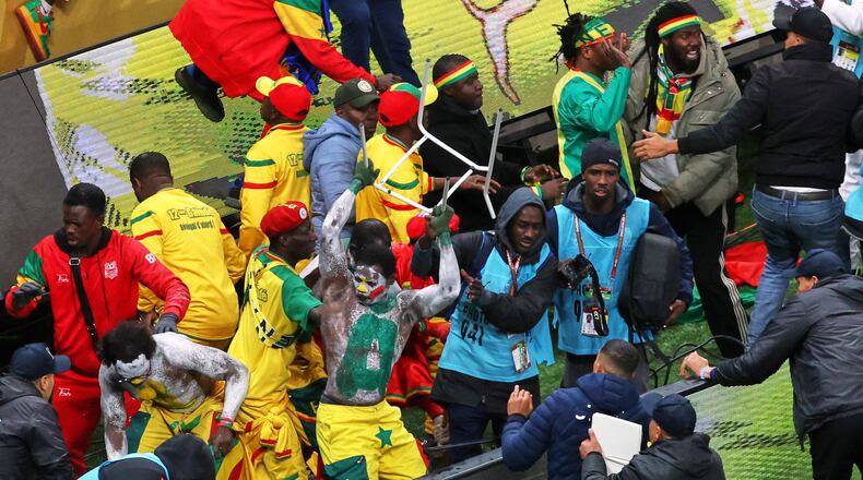 FILE - Senegal supporters protest after a controversial penalty was awarded to Morocco during the Africa Cup of Nations final soccer match between Senegal and Morocco on Jan. 18, 2026, in Rabat, Morocco. (AP Photo/Youssef Loulidi, File)