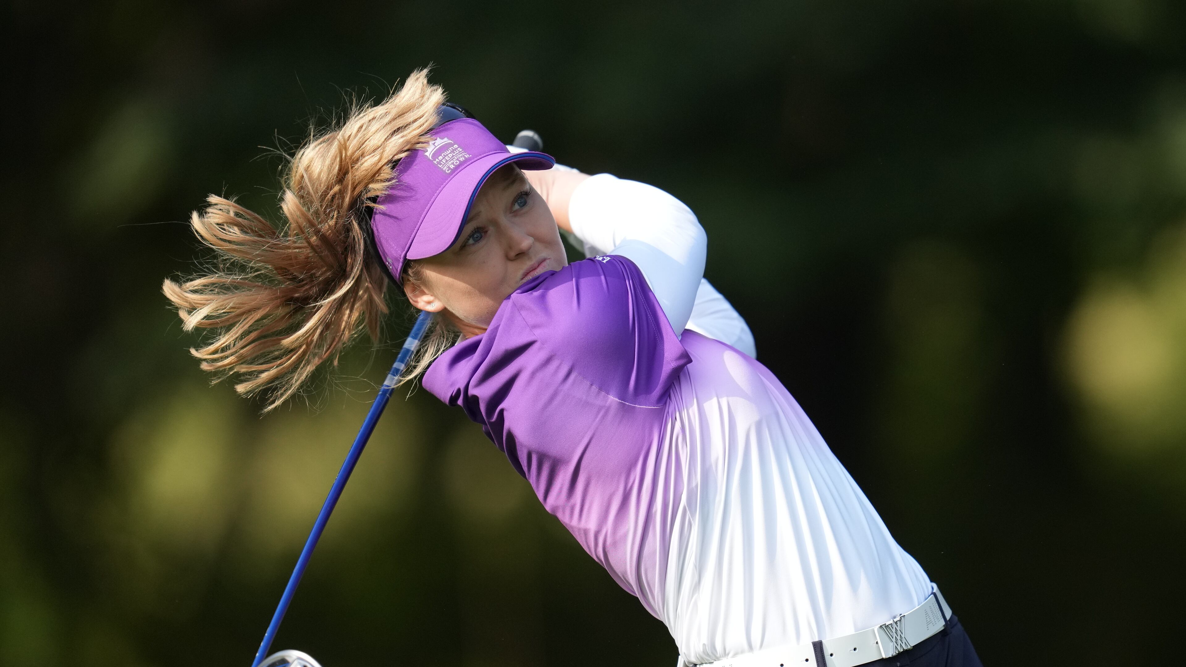 Brooke Henderson of World Team tees off on the fourth hole during the pool B match against Sweden team for the LPGA International Crown golf tournament at the New Korea Country Club in Goyang, South Korea, Saturday, Oct. 25, 2025. (AP Photo/Lee Jin-man)