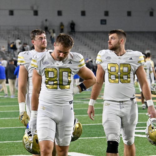 Georgia Tech players leave the field after Pittsburgh beat Georgia Tech during an NCAA college football game at Bobby Dodd Stadium, Saturday, November 22, 2025 in Atlanta. Pittsburgh won 42-28 over Georgia Tech. (Hyosub Shin / AJC)