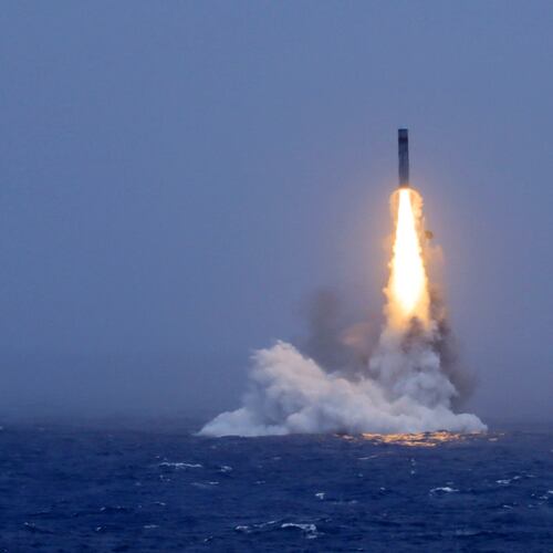 In this photo released by Xinhua News Agency, a long-range ballistic missile bursts out of the sea during a test launched from a Chinese nuclear-powered submarines in the South Pacific on Monday, July 6, 2026. (Li Xiangchao/Xinhua via AP)