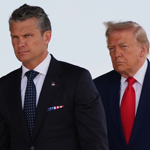 Defense Secretary Pete Hegseth and President Donald Trump attend the dignified transfer of four U.S. service members recently killed in the Middle East, Wednesday, July 22, 2026, at Dover Air Force Base, Del. (AP Photo/Julia Demaree Nikhinson)