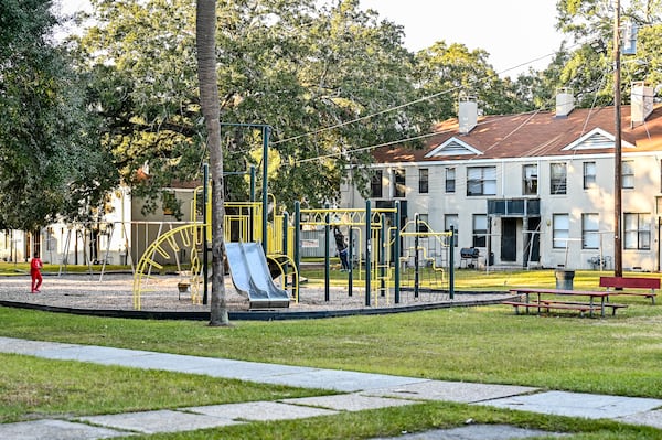 Children play on the playground of Yamacraw Village in Savannah, Ga. (Sarah Peacock for the AJC)