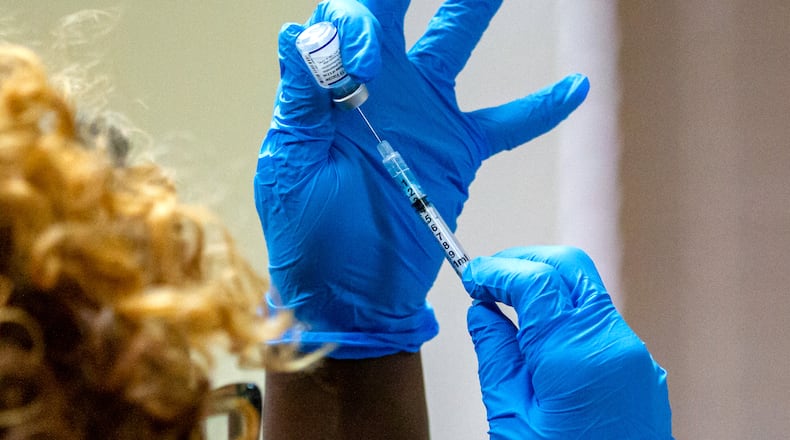 The federal government is preparing to recommend yet another shot as early as Tuesday. (File photo by STEVE SCHAEFER FOR THE ATLANTA JOURNAL-CONSTITUTION)