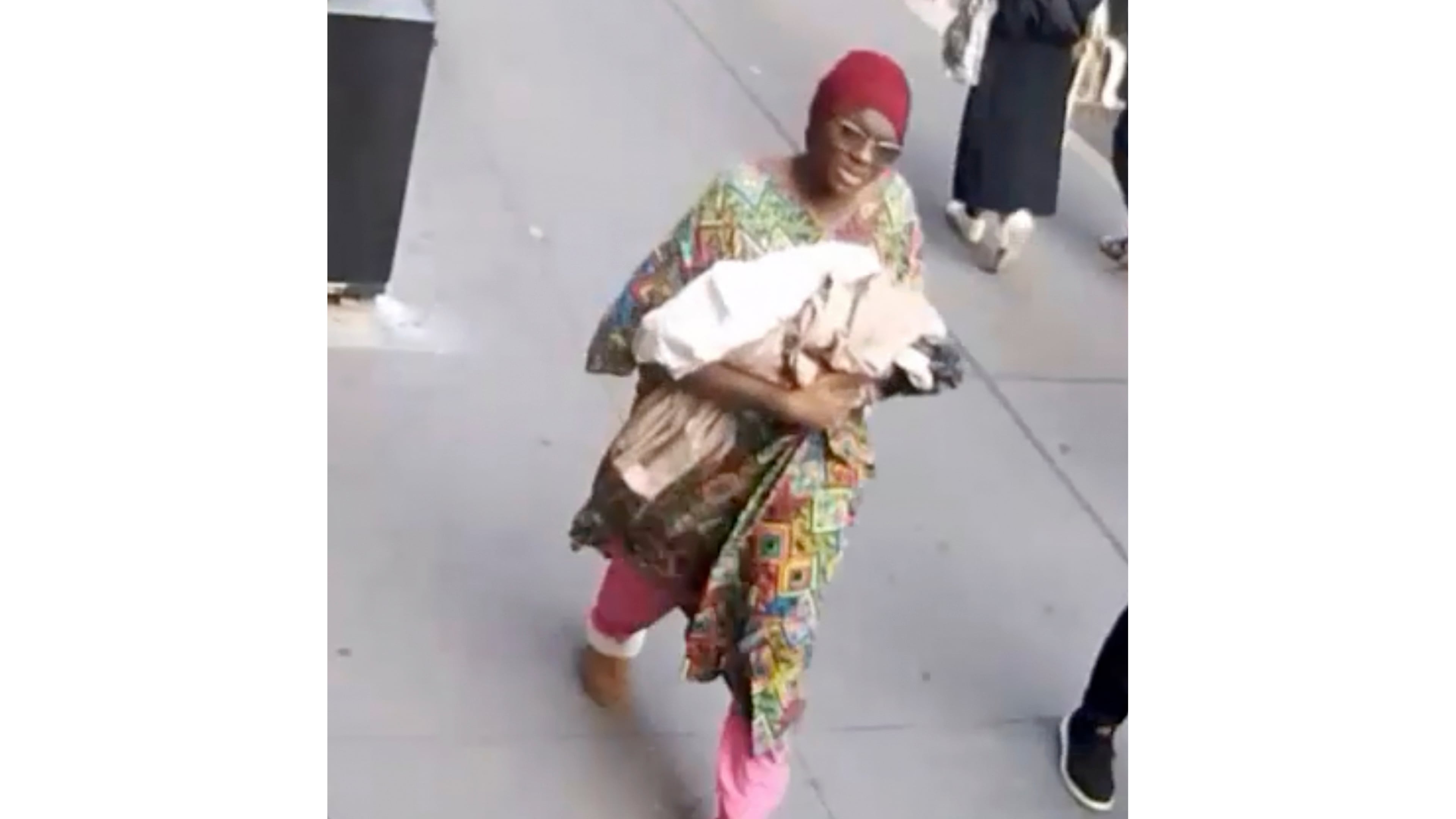 This photo taken from surveillance video footage provided by the New York Police Department, shows a woman who is wanted for questioning after an infant girl was abandoned at a New York City subway station Monday, Oct. 20, 2025 in New York. (New York Police Department via AP)