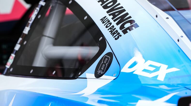 A decal is displayed on Denny Hamlin's car in honor of late driver Kyle Busch prior to a NASCAR Cup Series auto race, Sunday, May 24, 2026, in Charlotte, N.C. (AP Photo/Matt Kelley)