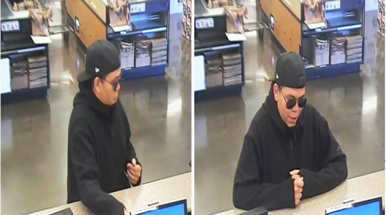 A Fifth Third Bank robbery was caught on a surveillance camera Thursday morning in Cobb County. (Credit: Cobb County Police Department)