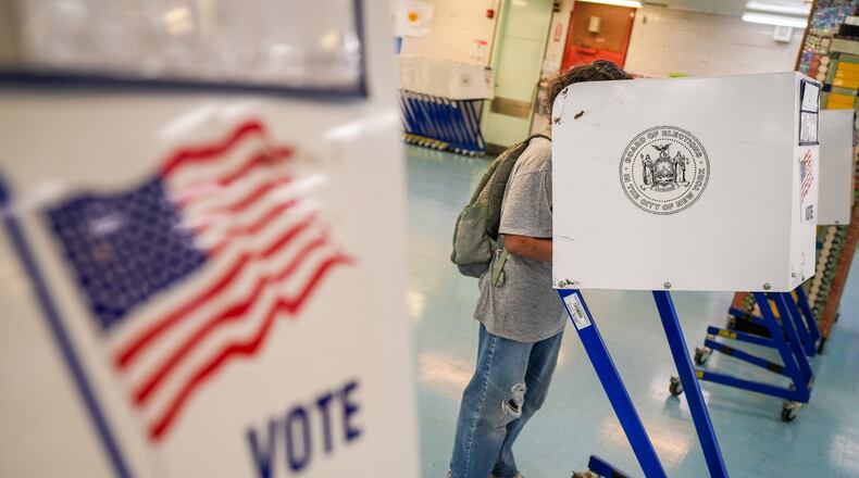 A voter casts a ballot during New York’s primary election on Tuesday, June 23, 2026, in New York. (AP Photo/Ryan Murphy)