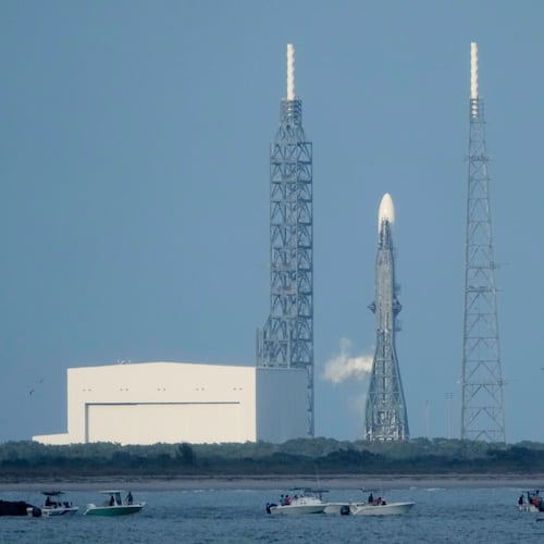 A Blue Origin New Glenn rocket stands ready on Launch Complex 36 a few minutes before the launch was scrubbed at the Cape Canaveral Space Force Station in Cape Canaveral, Fla., Sunday, Nov. 9, 2025. (AP Photo/John Raoux)