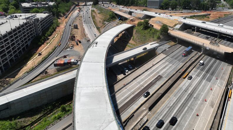 Aerial photo shows construction site of I-285 interchange at Ga. 400 in Sandy Springs on Tuesday. All northbound lanes on Ga. 400 will be closed at night in coming days as construction on the interchange continues. (Hyosub Shin / Hyosub.Shin@ajc.com)