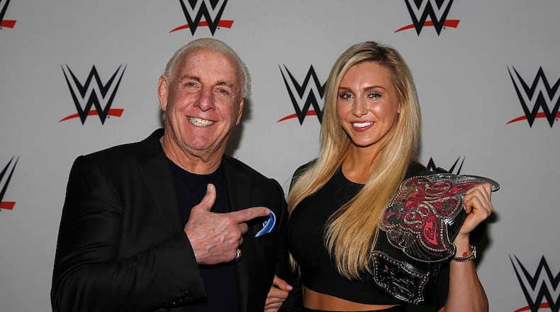 Ric Flair and his daughter Ashley, aka women's wrestler Charlotte, have collaborated on a book about their lives.