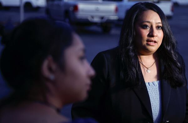 Change for Chee founders Layla Renee Contreras, right, and her sister and Apalachee High student Sasha Contreras, photographed outside of the Barrow County Board of Education building in Winder following a board meeting on April 1, 2025. The group was formed following the Apalachee High School shooting in 2024. (Natrice Miller/AJC)