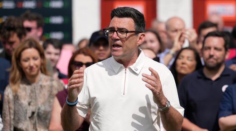 Britain's Labour party candidate Andy Burnham speaks to supporters after the Makerfield by-election in Ashton in Makerfield, England, Friday, June 19, 2026.(AP Photo/Jon Super)