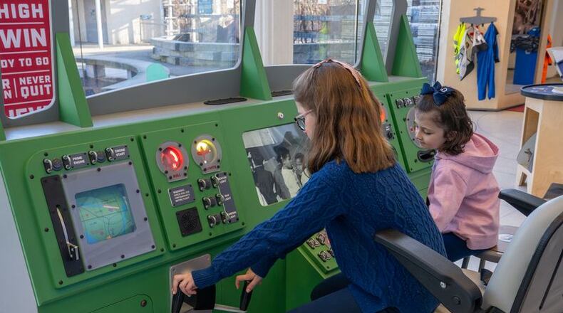 The Children’s Museum of Atlanta honors the legacy of the Tuskegee Airmen with an exhibit featuring hands-on installations, such as life-size cockpit flight trainers. The educational fun takes flight Saturday and Sunday, plus additonal dates. (Courtesy of Children’s Museum of Atlanta)