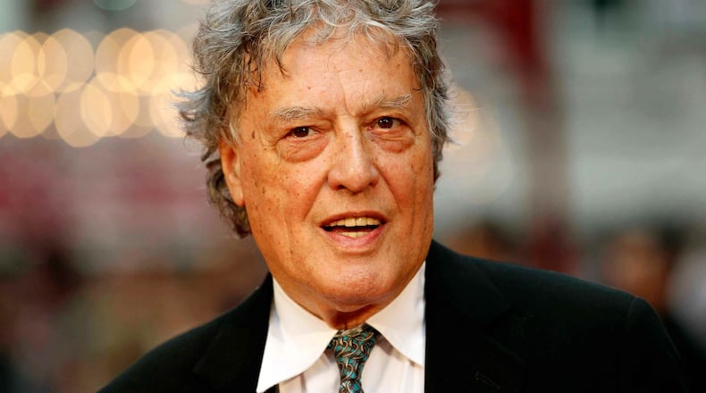 FILE - In this Sept. 4, 2012 file photo, British playwright Tom Stoppard poses as he arrives for the world premiere of "Anna Karenina," in London. (AP Photo/Sang Tan, File)