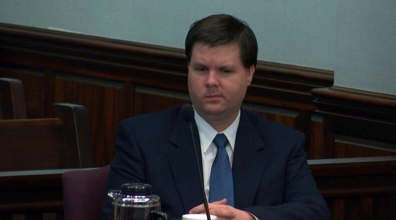 Justin Ross Harris listens to his lawyer Maddox Kilgore deliver his opening statement during Harris’ murder trial at the Glynn County Courthouse in Brunswick. (Screen capture via WSB-TV)