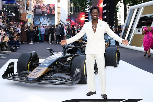 Damson Idris poses for photographers upon arrival at the premiere of the film 'F1 The Movie' on Monday, June 23, 2025, in London. (Photo by Scott A Garfitt/Invision/AP)
