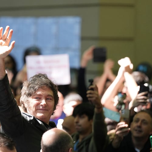 Argentina's President Javier Milei waves to supporters after voting during legislative midterm elections in Buenos Aires, Argentina, Sunday, Oct. 26, 2025. (AP Photo/Natacha Pisarenko)