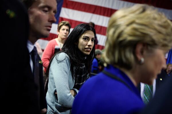 Huma Abedin, center, an aide to Sen. Hillary Rodham Clinton, right, and the wife of Rep. Anthony Weiner, during a campaign event in Manchester, Iowa. In her new memoir, “Both/And: A Life in Many Worlds,” Abedin opens up about her ex-husband, the 2016 election and more. (Doug Mills/ The New York Times)